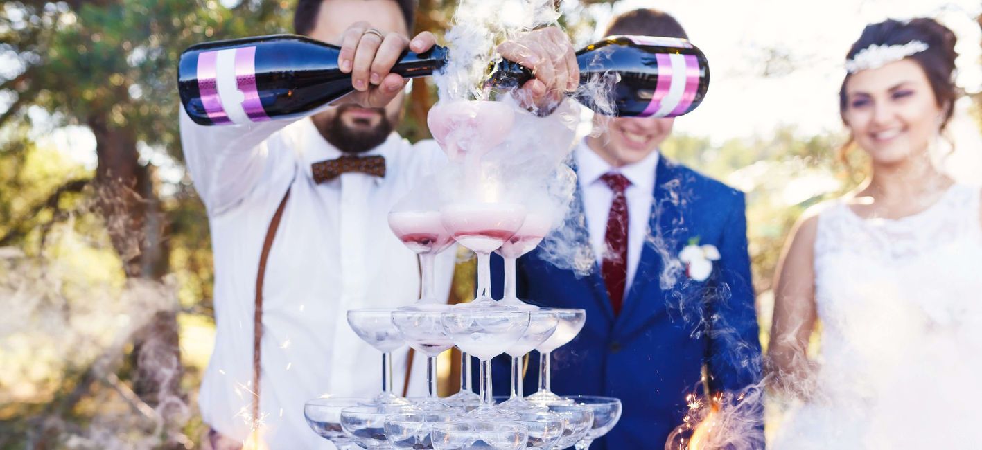 Wedding Bartender pouring Champagne