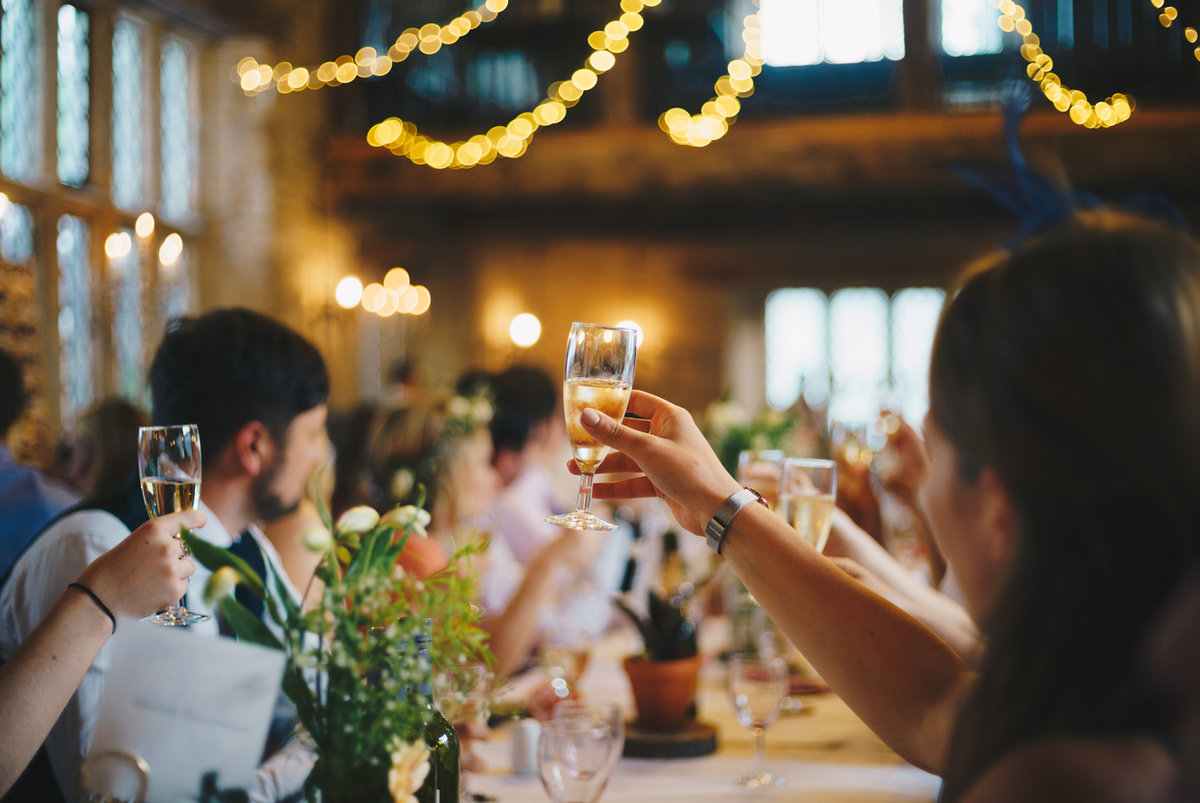 Insured bar service staffed by a bartender serving cocktails to guests