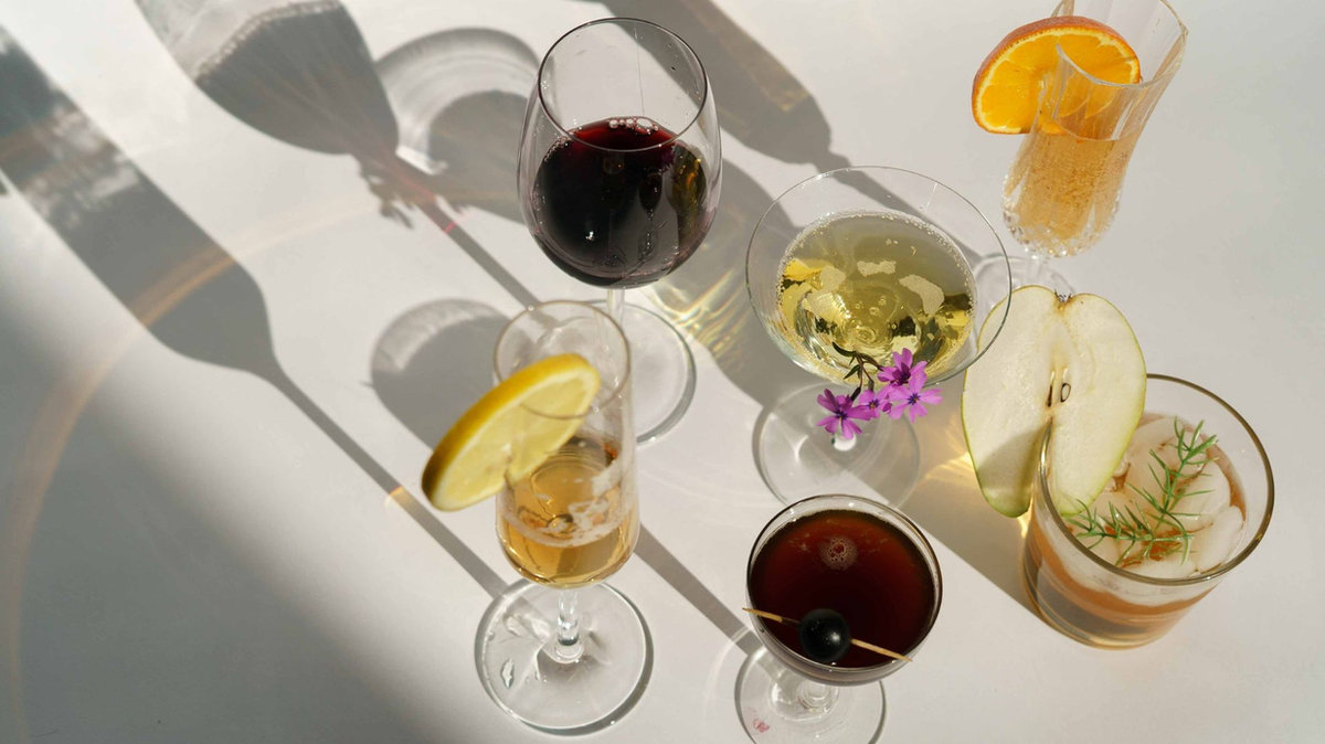 Licensed wedding bartender pouring champagne at a reception bar for guests
